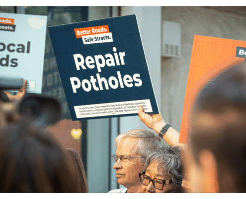 Better Roads, Safe Streets submits over 32,000 signatures to advance transportation measure Advocate of Better Roads Safe Streets holds up a sign "Repair Potholes" outside of the Fresno County Elections Office during press event announcing the submission of over 32,000 signatures to advance transportation measure toward November ballot