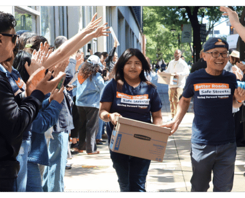 Better Roads, Safe Streets submits over 32,000 signatures to advance transportation measure Youth and volunteers walks one of fifteen boxes comprising of the 32,000 signatures collected by Better Roads, Safe Streets to advance the Better Roads, Safe Streets transportation measure