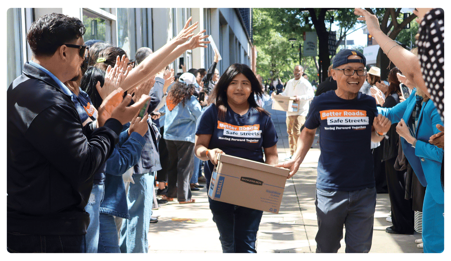 Better Roads, Safe Streets submits over 32,000 signatures to advance transportation measure Youth and volunteers walks one of fifteen boxes comprising of the 32,000 signatures collected by Better Roads, Safe Streets to advance the Better Roads, Safe Streets transportation measure
