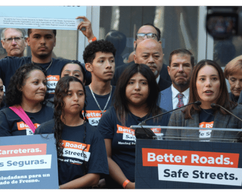 Better Roads, Safe Streets submits over 32,000 signatures to advance transportation measure Veronica Garibay speaking to public during press event announcing the submission of over 32,000 signatures to advance Better Roads Safe Streets transportation measure toward November ballot