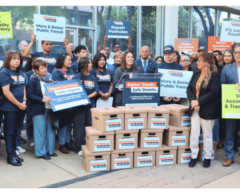 Better Roads, Safe Streets submits over 32,000 signatures to advance transportation measure Veronica Garibay speaking to public during press event announcing the submission of over 32,000 signatures to advance Better Roads Safe Streets transportation measure toward November ballot