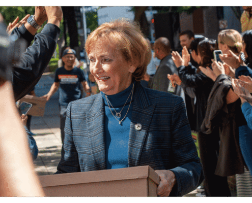 Better Roads, Safe Streets submits over 32,000 signatures to advance transportation measure Lynne Ashbeck walks one of fifteen boxes comprising of the 32,000 signatures collected by Better Roads, Safe Streets to advance the Better Roads, Safe Streets transportation measure