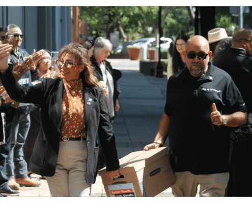 Better Roads, Safe Streets submits over 32,000 signatures to advance transportation measure Advocates walk one of fifteen boxes comprising of the 32,000 signatures collected by Better Roads, Safe Streets to advance the Better Roads, Safe Streets transportation measure